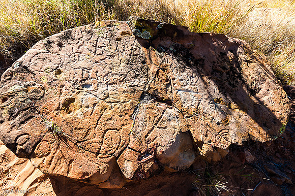 Petroglyph created by pounding and "pecking" at the flat rock