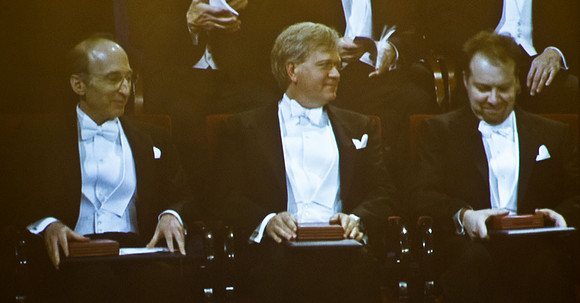 The three Physics Nobelists with their medals