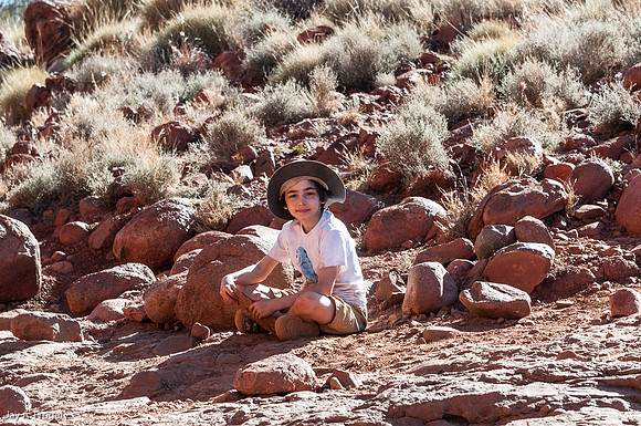 Leah shaping rocks
