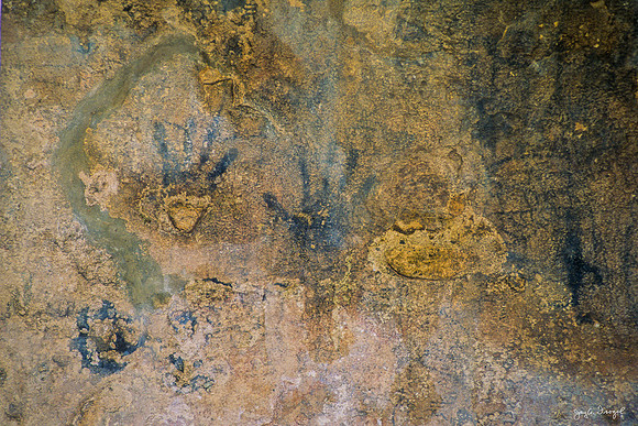 Tulum:  Hand prints on Wall of Structure on top of El Castillo