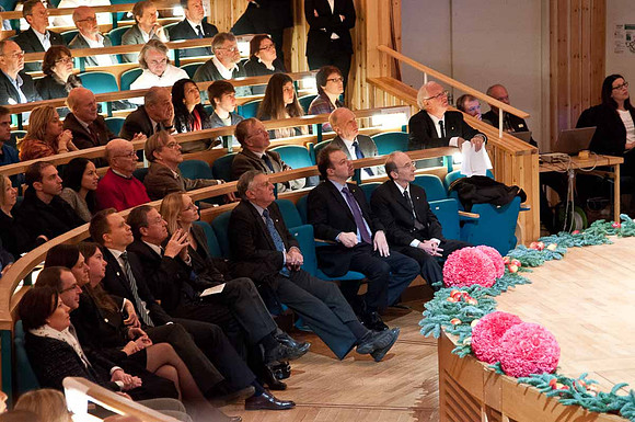 Opening Ceremony for physics winners - Saul and Adam listening to Brian Schmidt